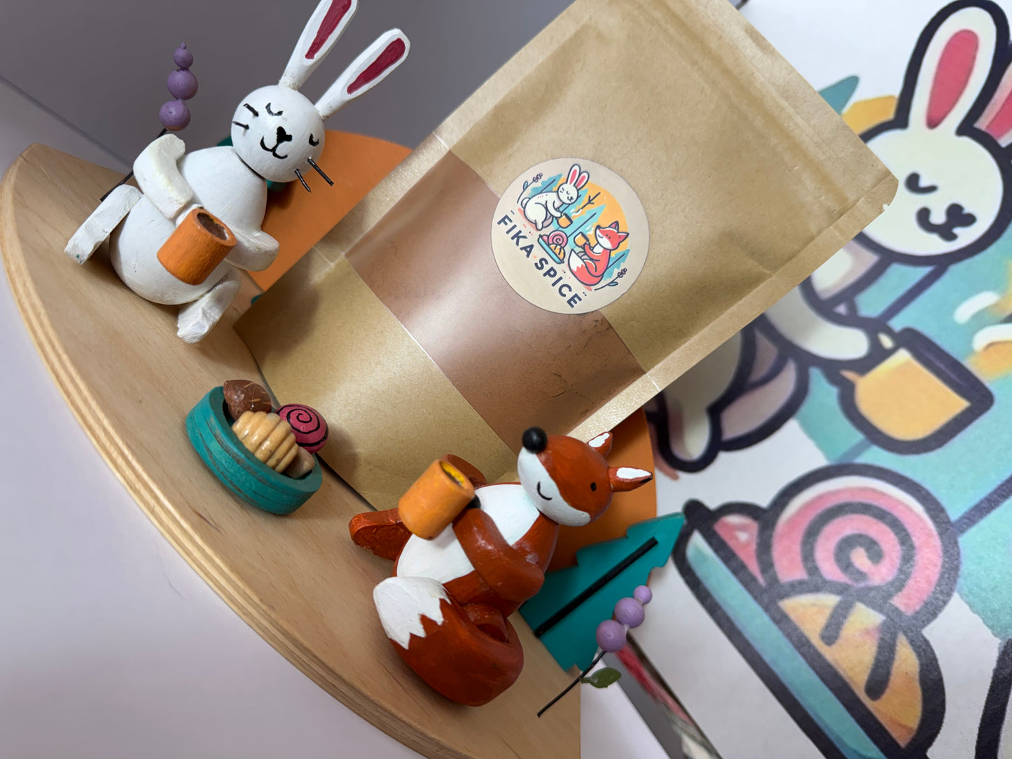 Wooden toy set with animals and a bag labeled 'Nika Spice' on a colorful background. Fika Spice Scandinavian coffee spice blend with cinnamon and cardamom crated with antioxidant-rich spices for a daily healthy treat.