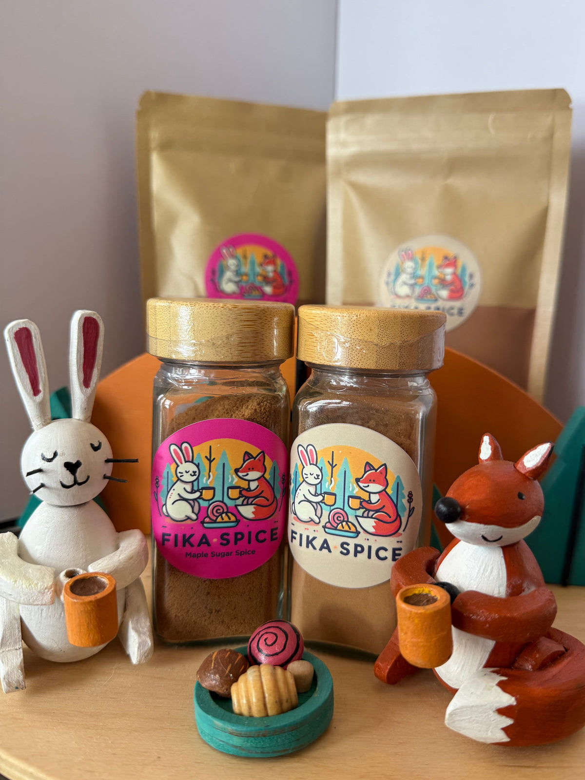 Spice jar with decorative packaging on a wooden surface